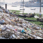 garbage and plastic pollution on the river bank in Dhaka, Bangladesh ...