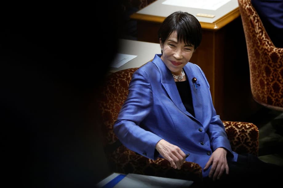 Japan's prime minister joins female lawmakers in fight for more ...